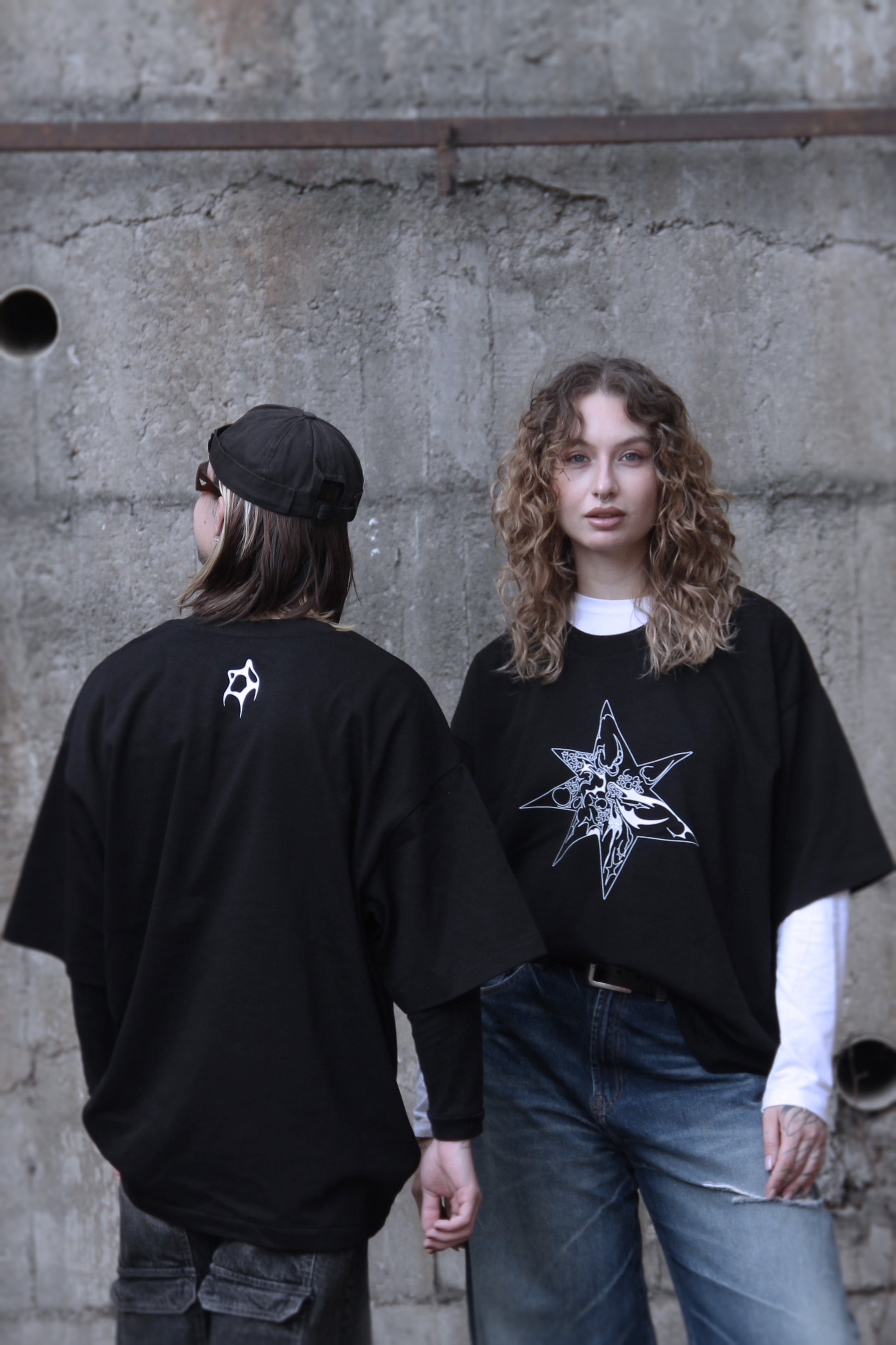 Black oversized t-shirt with white abstract star print on organic cotton