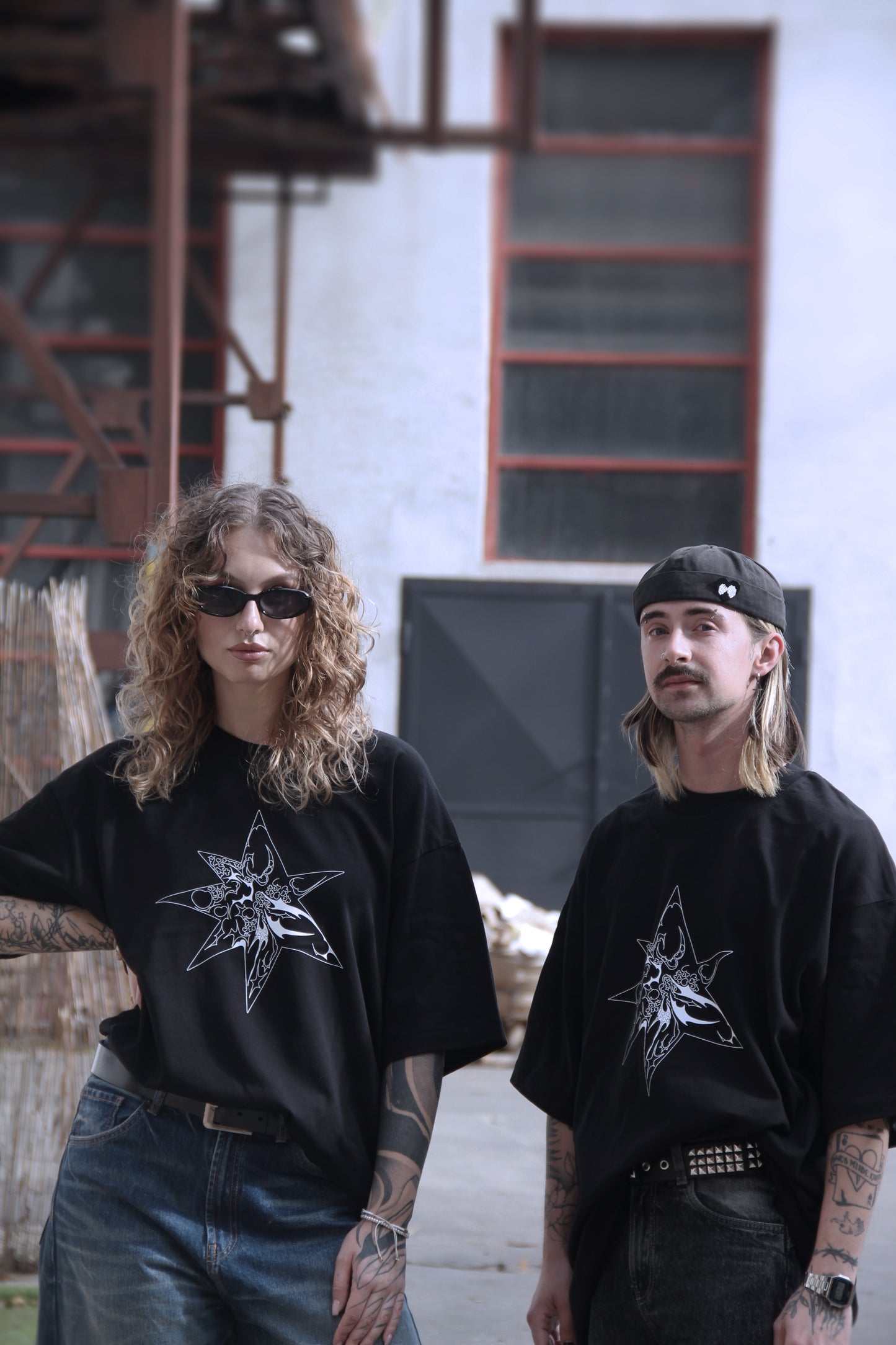 Black oversized t-shirt with white abstract star print on organic cotton