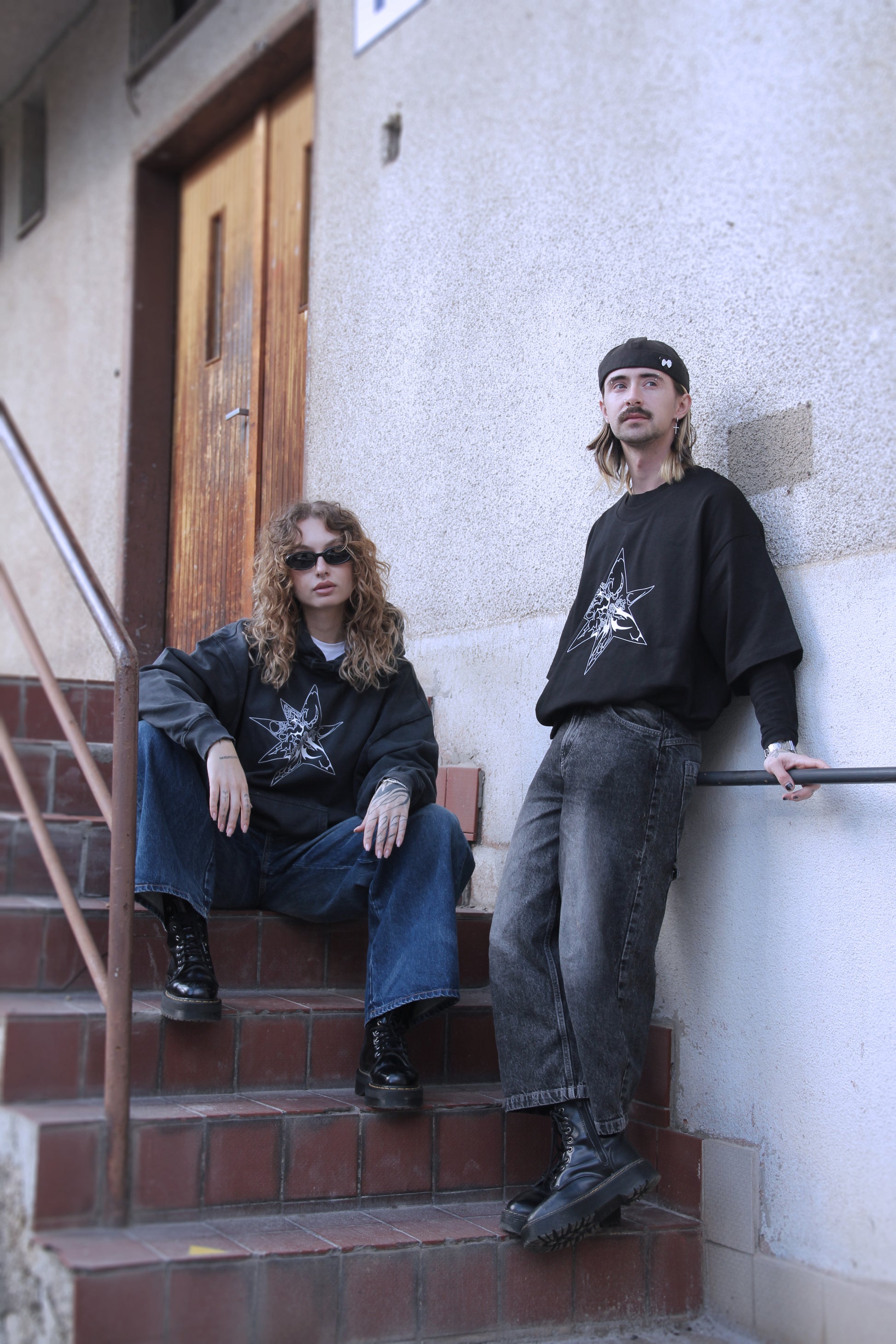 Black oversized t-shirt with white abstract star print on organic cotton